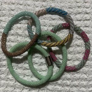 5 Sashka Co handcrafted beaded bracelets. Mint and gold. Approx 8”.